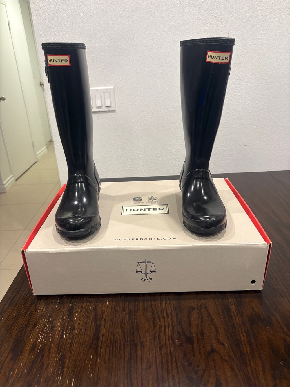 Hunter Men's Tall Gloss Black Rain Boots with Red Logo